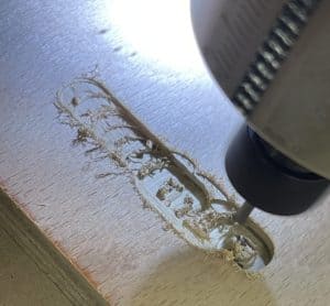 1. Cordless drill drilling into wood for DIY maker projects.