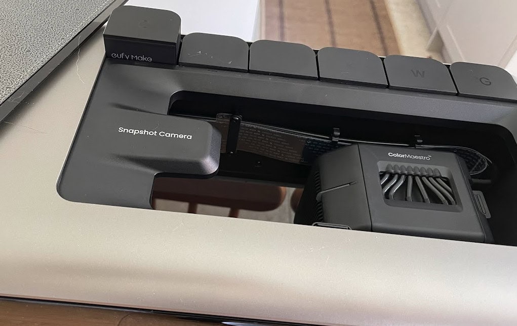 Close up of the ink cartridges, camera and print head