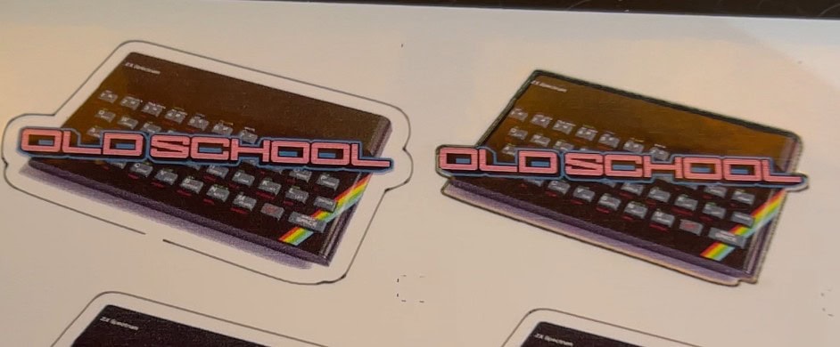 On the left visible black cut line, on the right the cut line is close to the print so less obvious