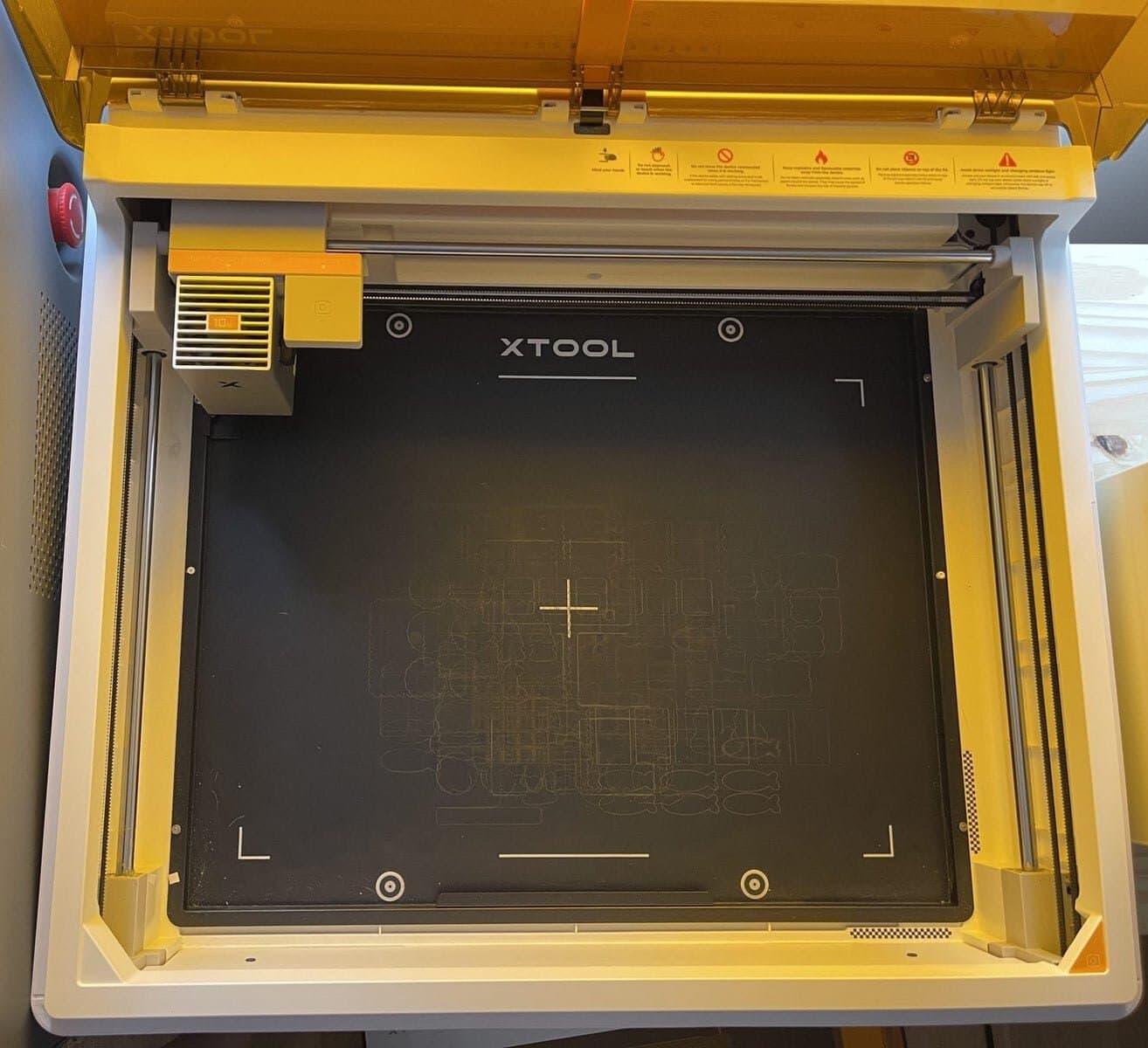 XTool M2 laser engraver and cutter machine with damaged baseplate