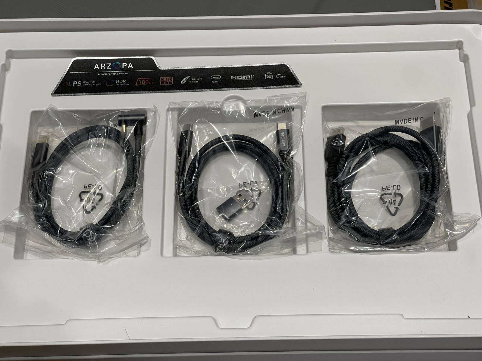 Arzopa Z3FC box tray with three braided cables: right-angle USB-C, straight USB-C with USB-A adapter, and mini HDMI to HDMI