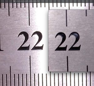 Steel rule under the microscope without the diffuser hood, left, and with it, right