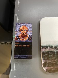 Mixed height test on the xTool O1 Omni, USB stick sharp and coaster blurred